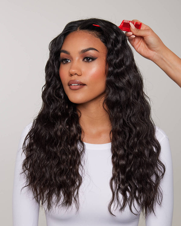 Section your hair using a pin comb or clip. Take clean, straight sections.